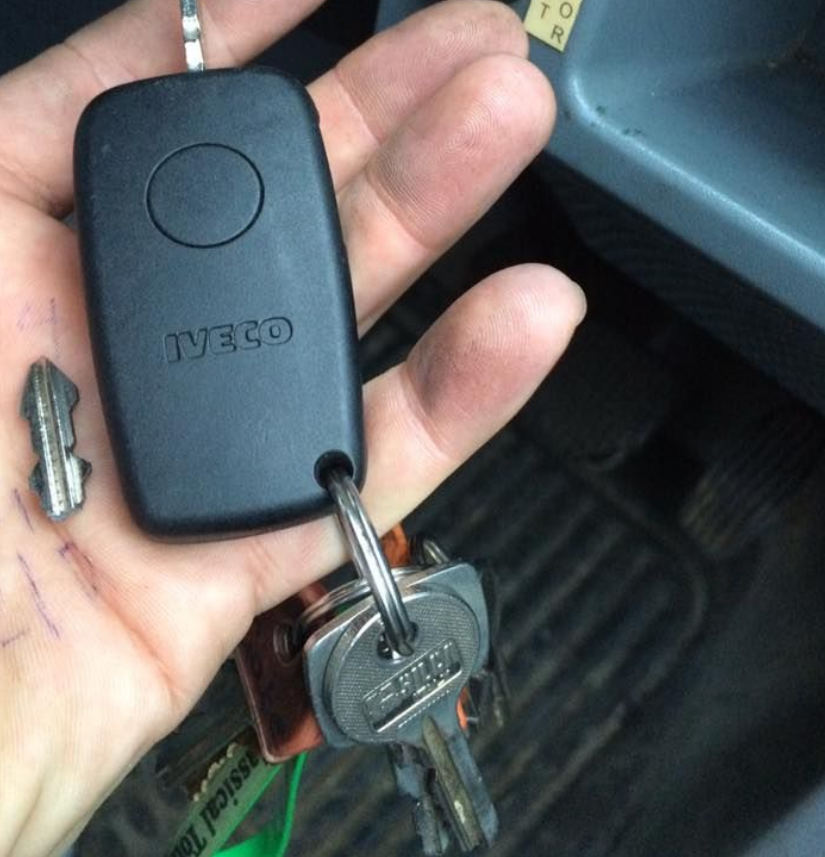 Alt text: "Professional ABC Locksmith Ohio technician expertly extracting a broken car key from a vehicle lock, showcasing expert automotive locksmith services for quick and reliable key removal"