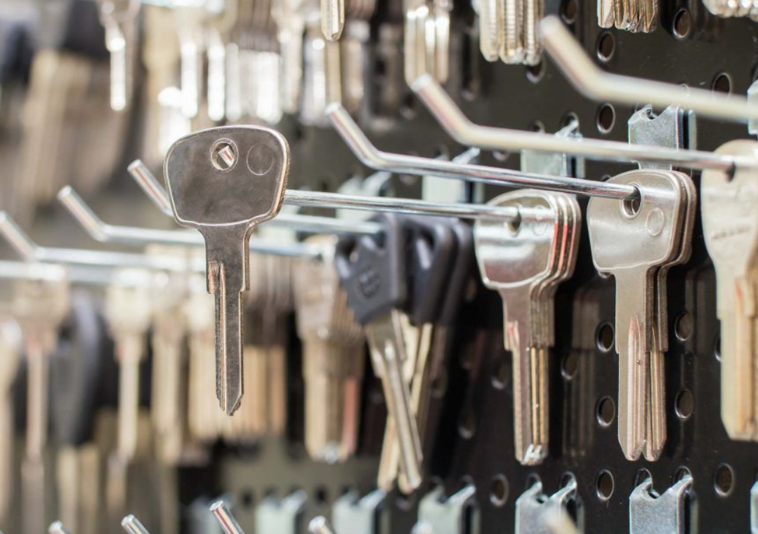 Image depicting a skilled ABC Locksmith Ohio technician unlocking a residential door in Columbus, Ohio, showcasing professional locksmith services.